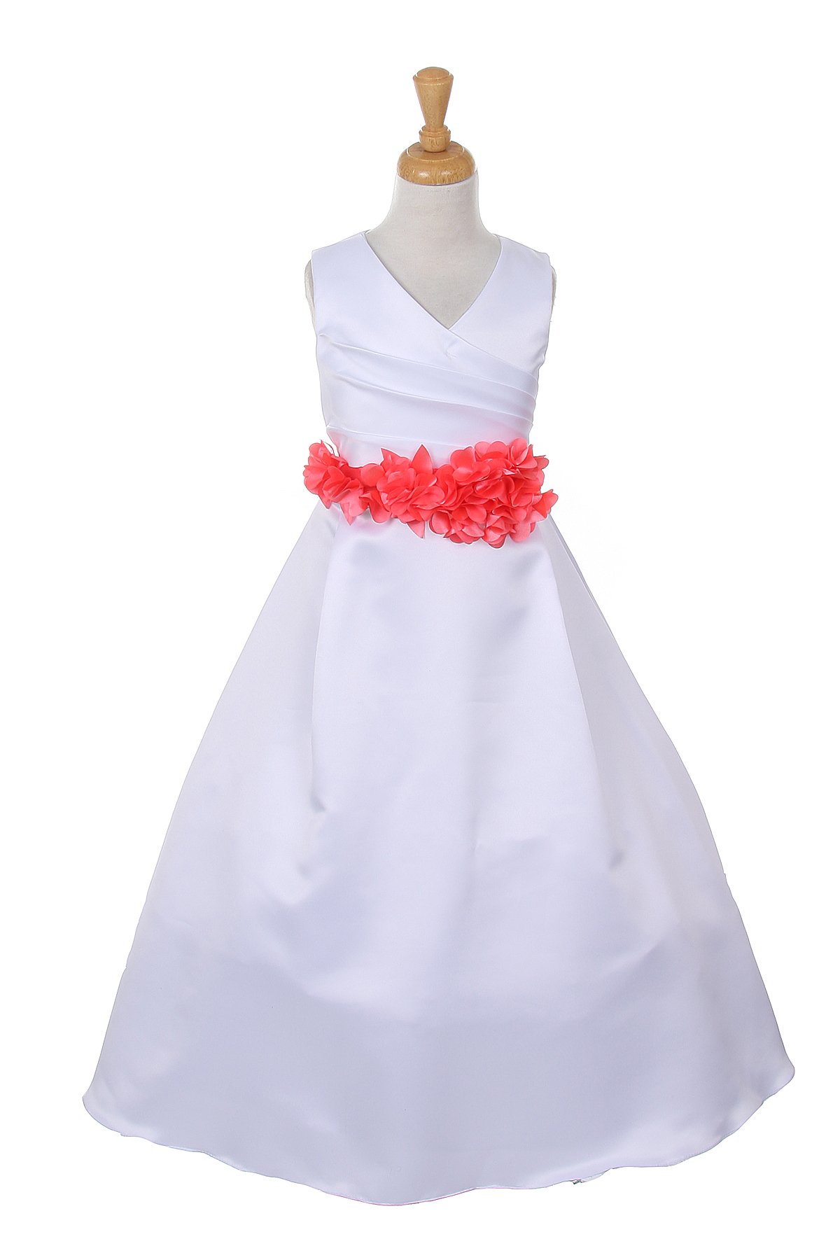 white dress with coral flower sash